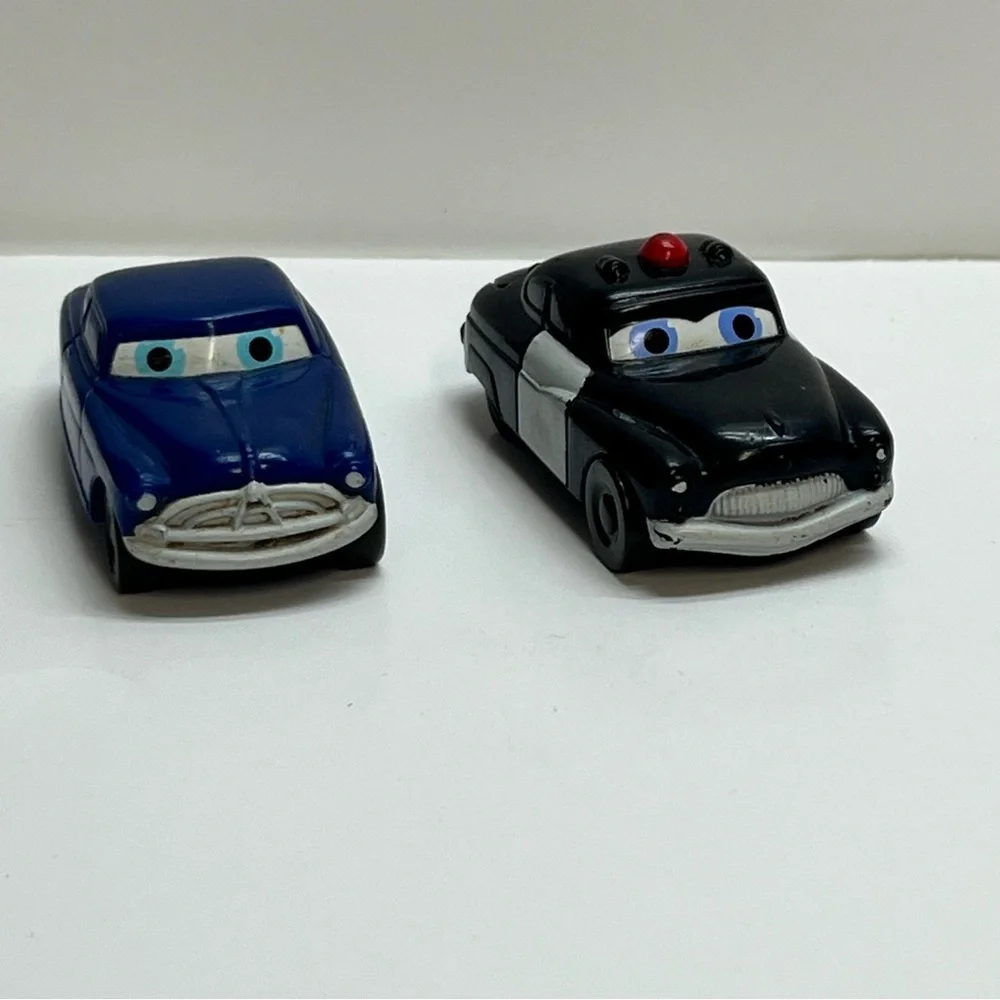 disney pixar cars doc hudson and sheriff‎ kellogg promo 2006